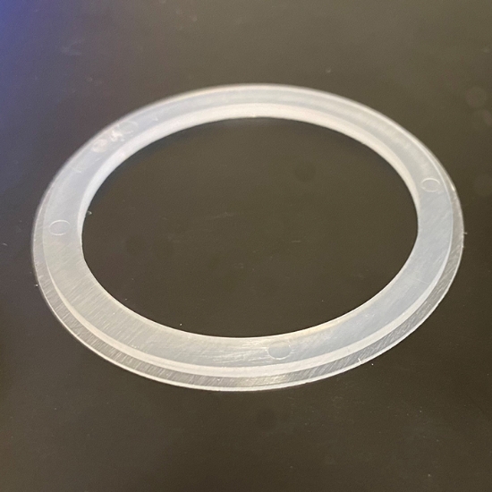 Underläggsbricka för B&M trycken och behör Ø54mm 54SR. Förebygger köldbrygga. Plast transparent.